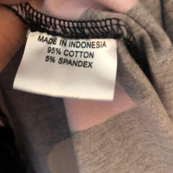 Black, v-neck dress with circle design and 3/4 length sleeve - Picture 5 of 6